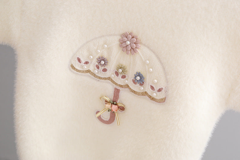 Maglione principessa con ombrello ricamato