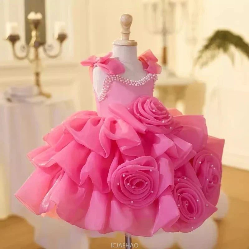 Vestido infantil rosa de lujo con lazos