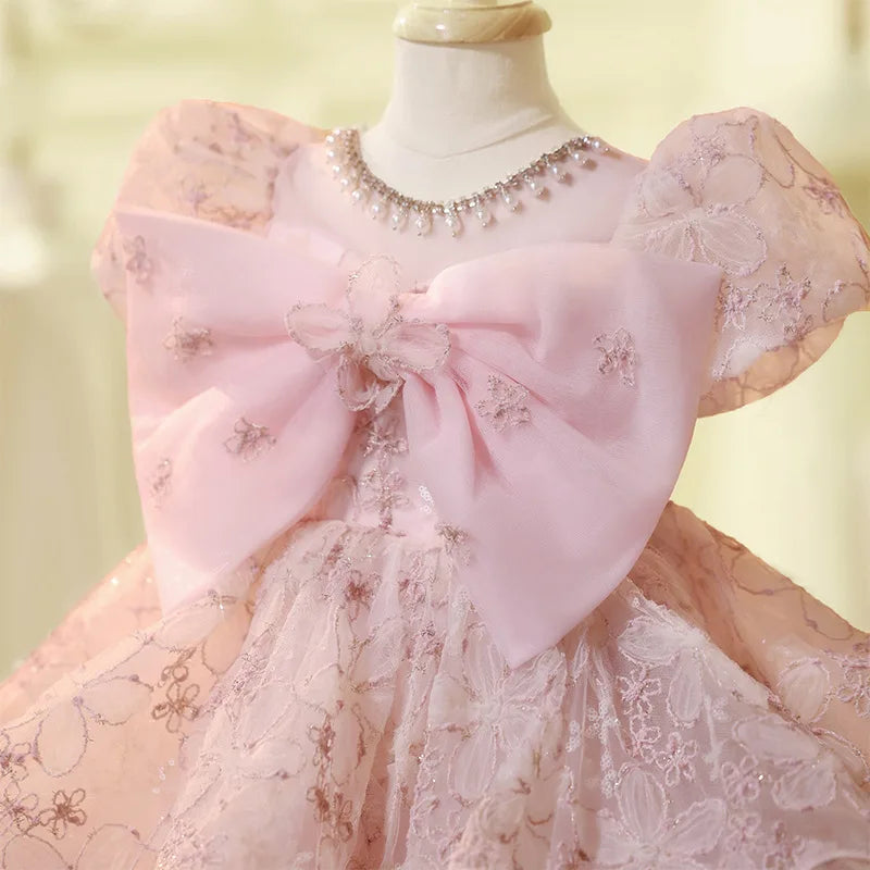 Vestido de fiesta infantil con lazo rosado encantado
