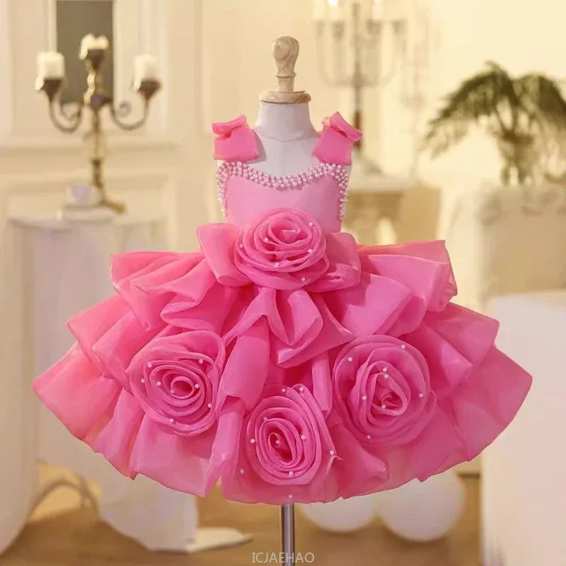 Vestido infantil rosa de lujo con lazos