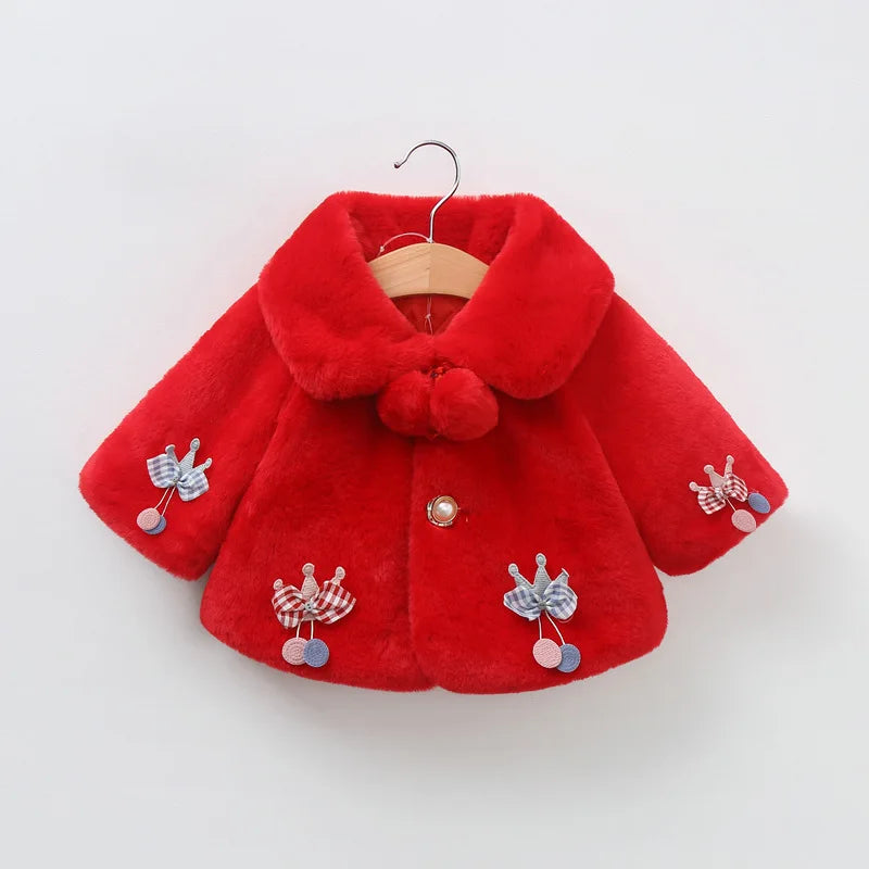 Red baby girl faux fur coat with pom-pom collar, a Christmas outfit for babies