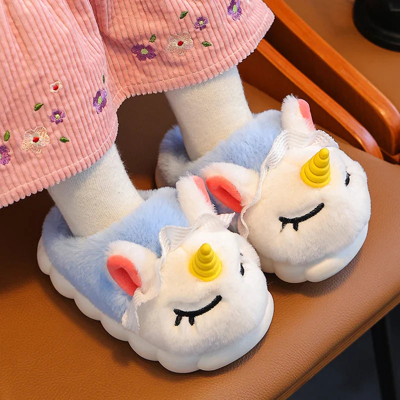 Girl wearing sky blue unicorn plush cloud slippers