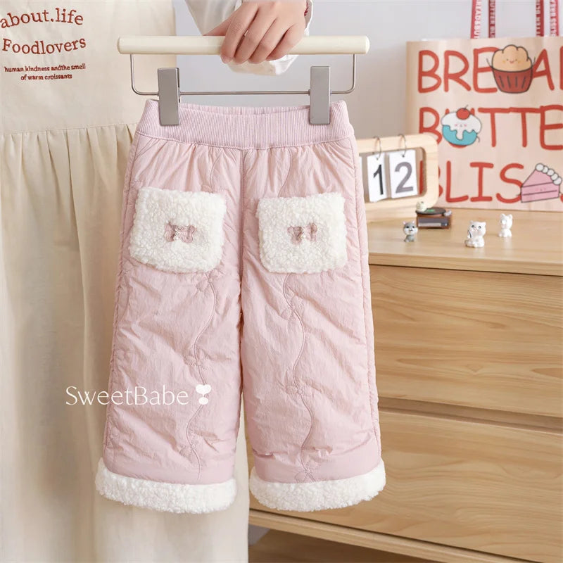 Blush pink girls quilted fleece-lined winter pants with bow pockets