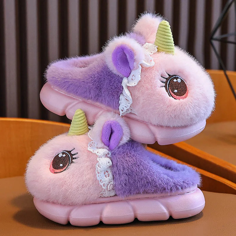 Side view of girls unicorn slippers showing open back and thick cushioned sole