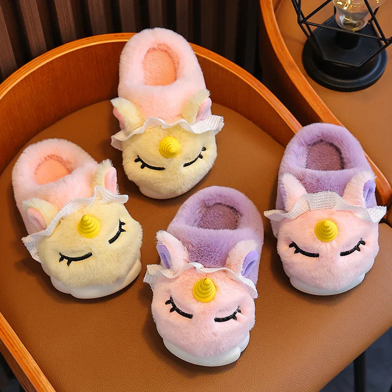 Kids unicorn plush slippers in blush pink and lavender with lace trim