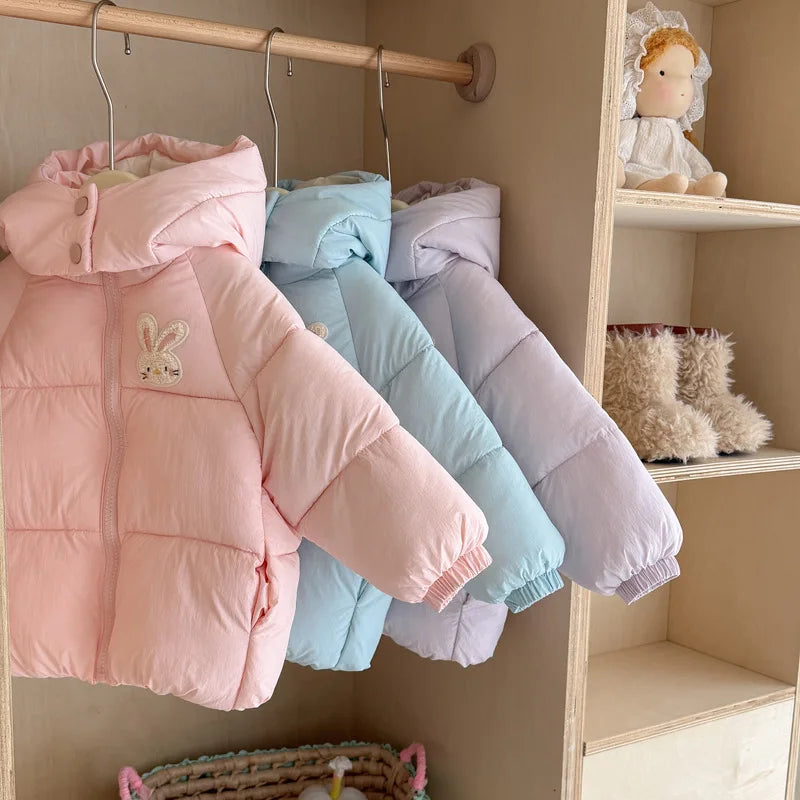 Girls' cozy hooded padded winter jacket in soft blue with zip-up front