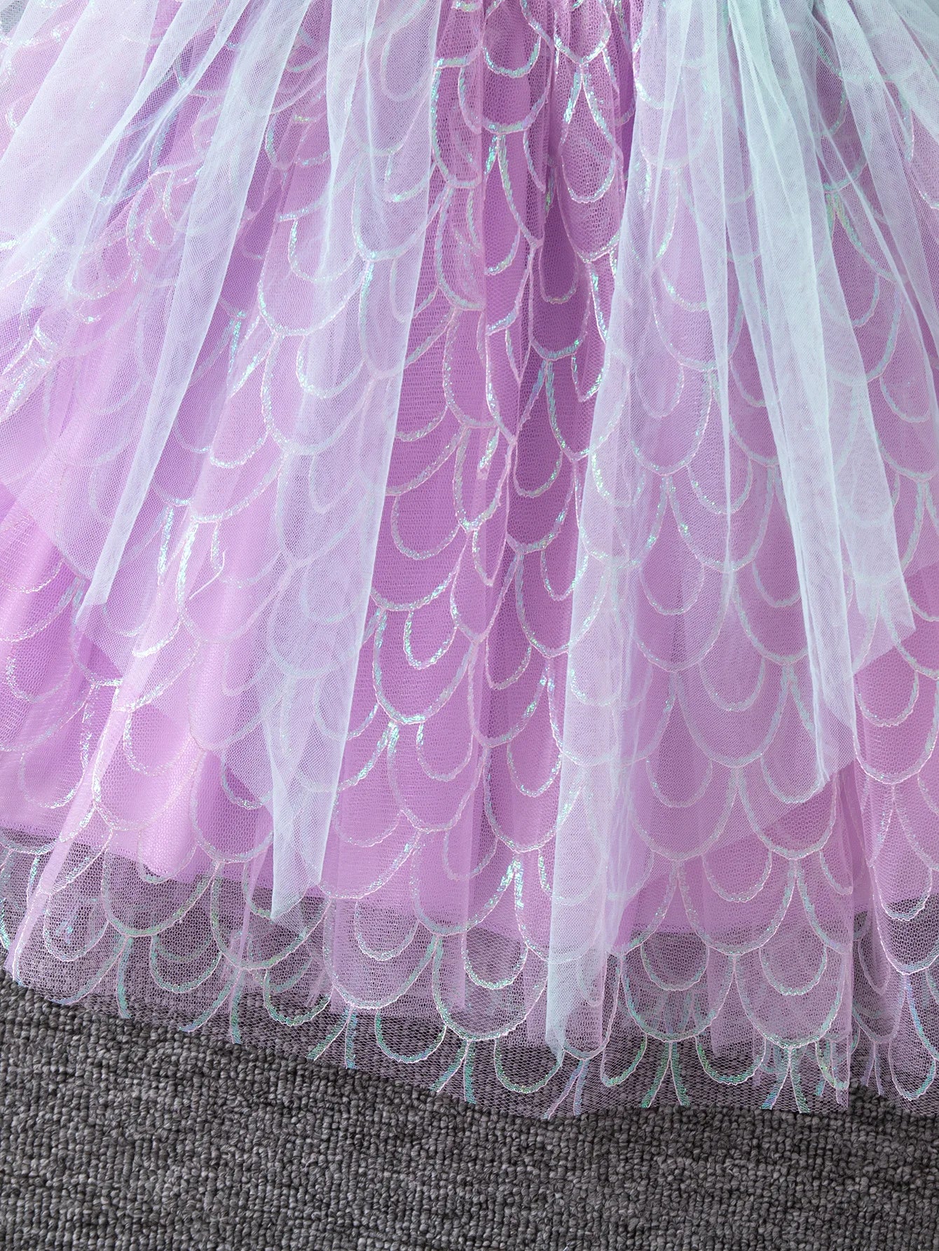 Girl twirling in sea-inspired mermaid party costume dress by Magic Tree Kids