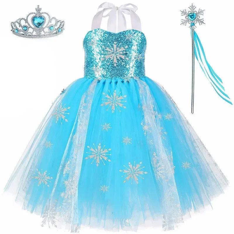 Girl wearing a glittering ice princess tutu gown with snowflake details