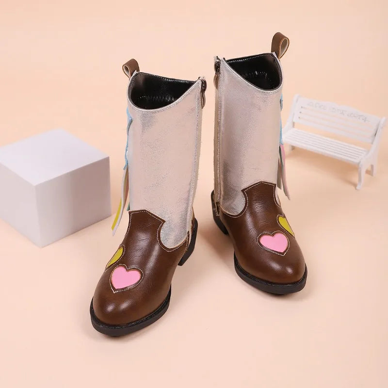 Close-up of western-style detailing on kids' cowgirl boots