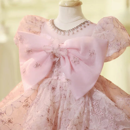 Vestido de fiesta infantil con lazo rosado encantado 
