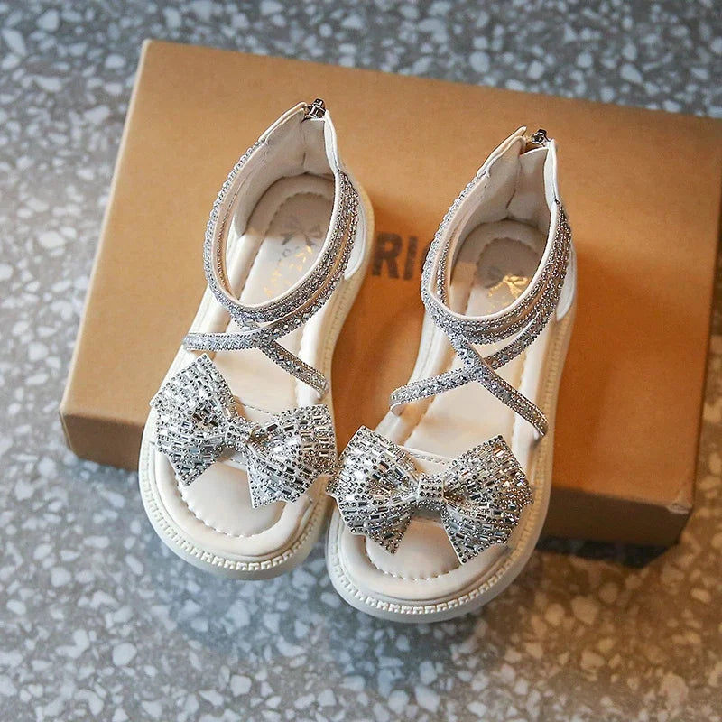 Sandalias de gladiador con lazo brillante