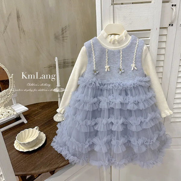 Completo in tulle con balze