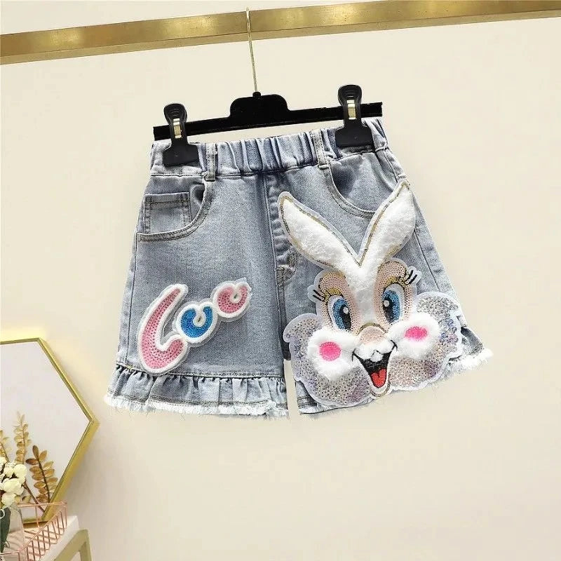 Shorts vaqueros con volantes y diseño de conejito brillante