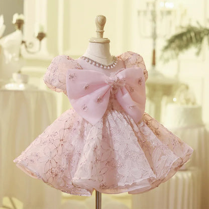 Vestido de fiesta infantil con lazo rosado encantado 