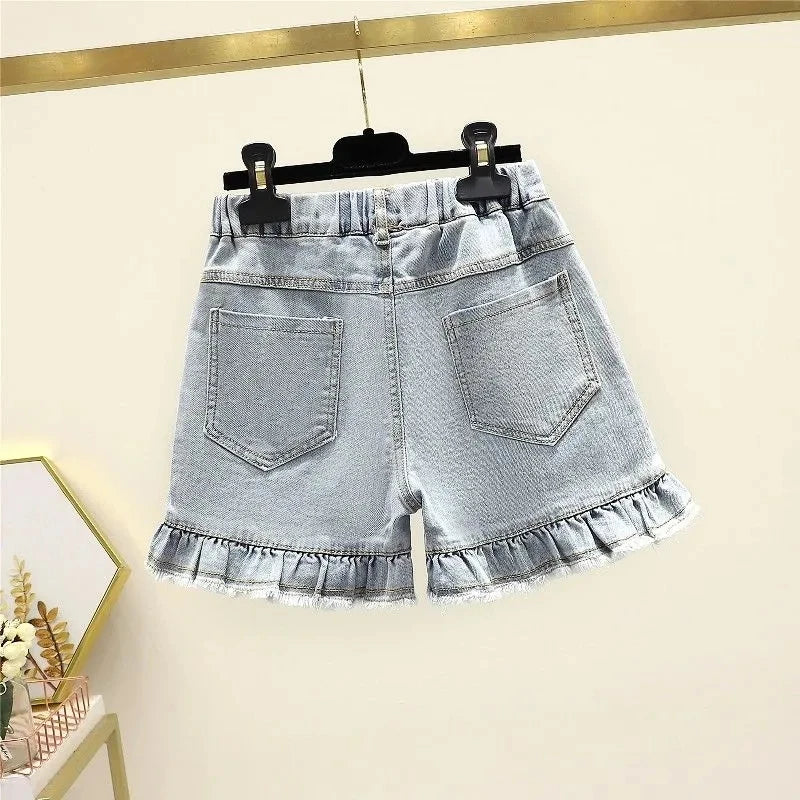 Shorts vaqueros con volantes y diseño de conejito brillante