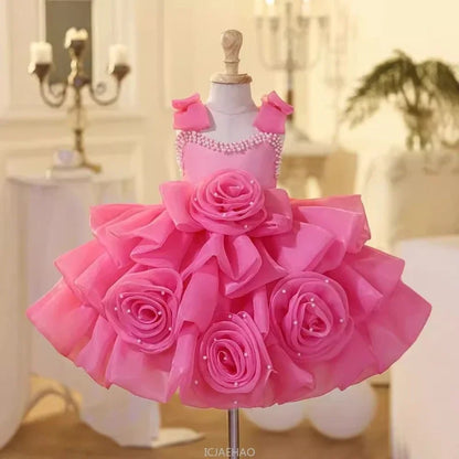 Vestido infantil rosa de lujo con lazos