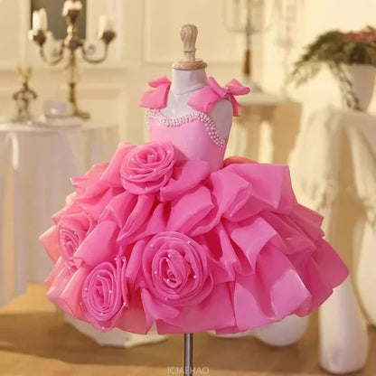 Vestido infantil rosa de lujo con lazos