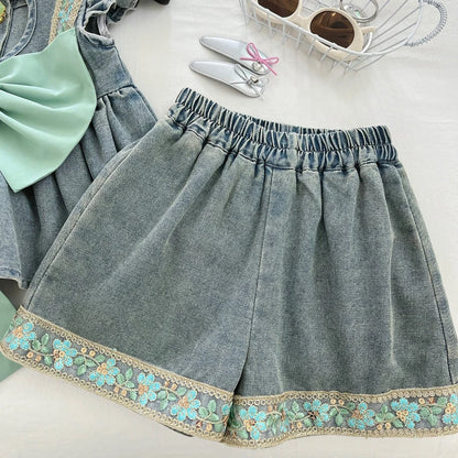 Completo per bambine con fiocco verde in denim floreale