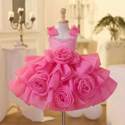 Vestido infantil rosa de lujo con lazos