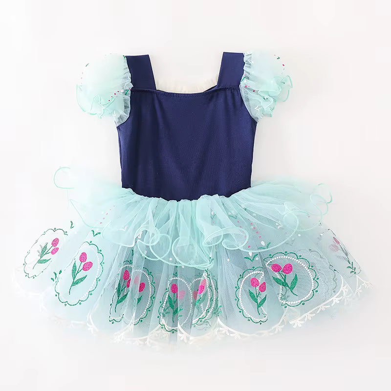 Little girl twirling in a winter princess tutu dress from Magic Tree Kids dance practice collection