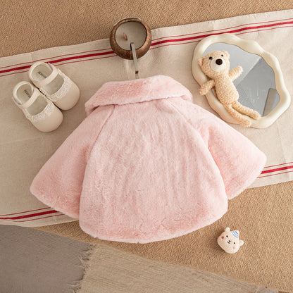 Back view of the blush pink baby faux fur cape coat