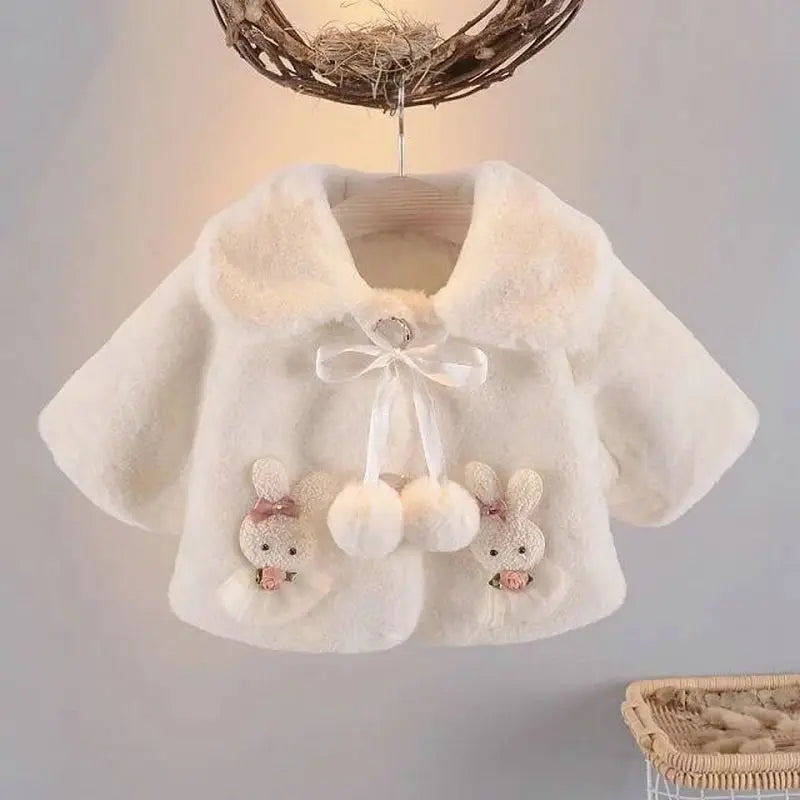 Ivory baby girl faux fur coat with bunny appliqués and white pom-poms