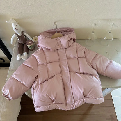 Warm zip-up winter coat with pillowy puffed silhouette for girls