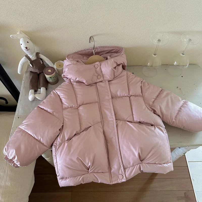 Warm zip-up winter coat with pillowy puffed silhouette for girls