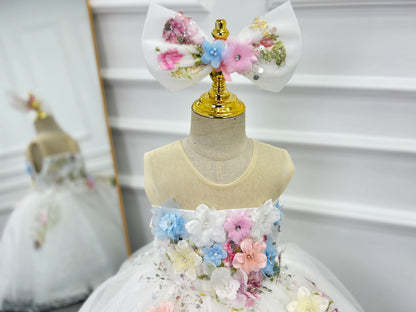 Close-up of the sheer illusion neckline and 3D flower bodice on the flower girl dress