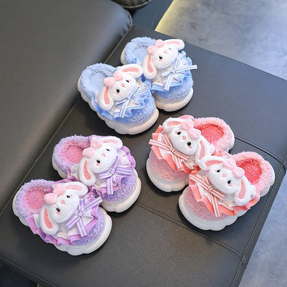 Girls bunny plush slippers with ruffle and bow in sky blue, lavender and coral pink