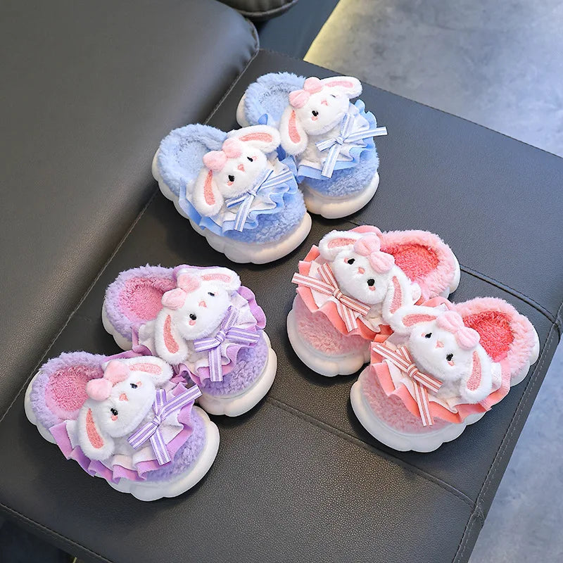 Girls bunny plush slippers with ruffle and bow in sky blue, lavender and coral pink