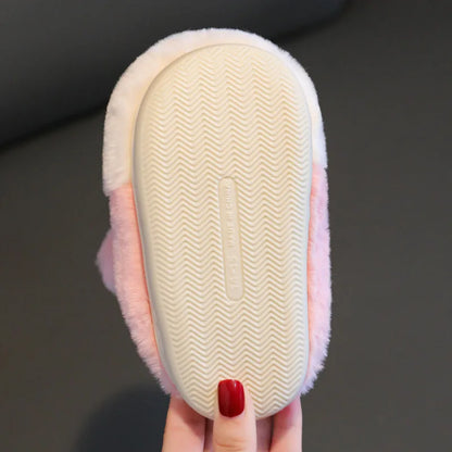 Non-slip textured sole on girls fluffy bunny slippers