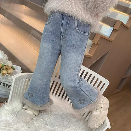 Embroidered heart near the ankle on girls fleece-lined flare jeans