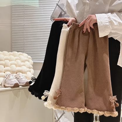 Black, cream and mocha brown girls corduroy flare pants with pom-pom trim