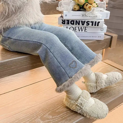 Girls fleece-lined bell bottom jeans with faux fur trim in light blue wash