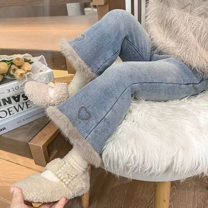 Girls fleece-lined flare jeans with faux fur hem and embroidered heart
