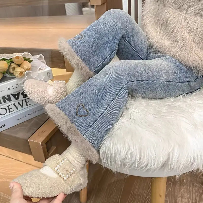 Girls fleece-lined flare jeans with faux fur hem and embroidered heart
