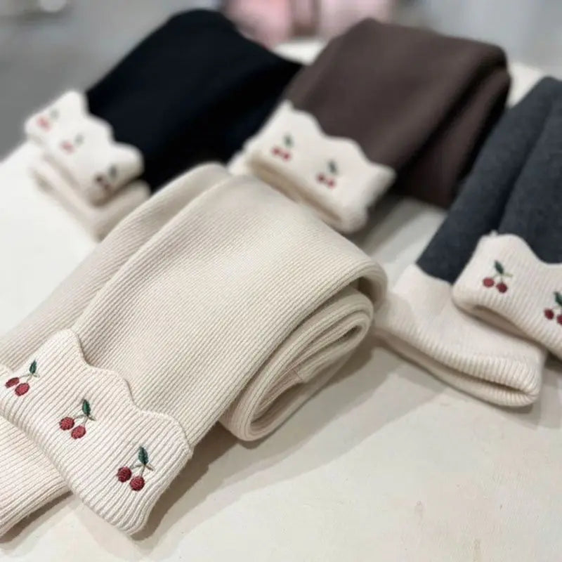 Girls fleece-lined leggings with scalloped cuffs and cherry embroidery in cream, mocha, gray and black
