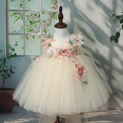 Girls champagne tulle princess gown with 3D floral appliqués