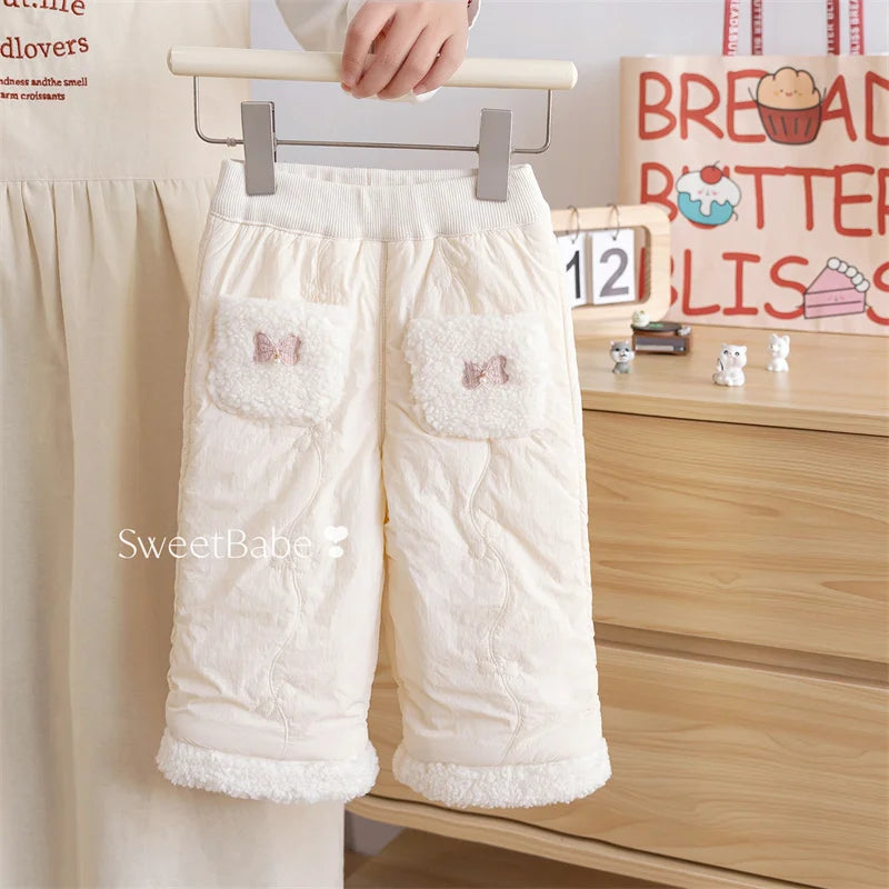 Cream girls quilted fleece-lined winter pants with sherpa bow pockets