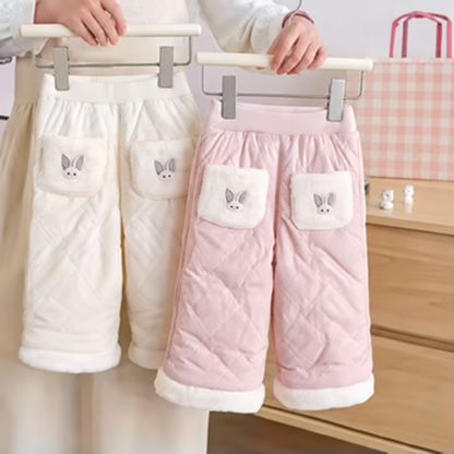 Girls quilted fleece-lined winter pants in cream and blush pink with sherpa pockets and cuffs