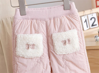 Sherpa pocket patches with embroidered bows on girls quilted fleece-lined pants
