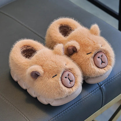 Kids fluffy capybara plush slippers in caramel brown with sleepy face