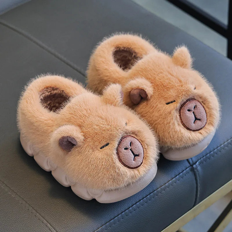 Kids fluffy capybara plush slippers in caramel brown with sleepy face
