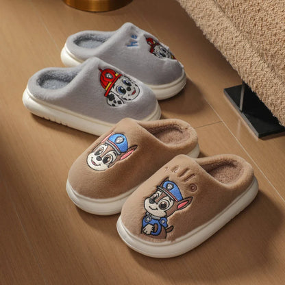 Gray and mocha brown kids plush slide slippers on a step
