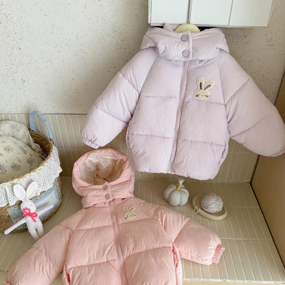 Close-up of fluffy rabbit embroidery detail on girls' winter jacket