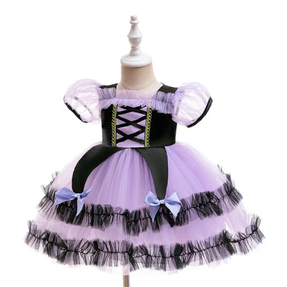 Little Purple Witch Halloween dress with bow detail and full skirt by Magic Tree Kids