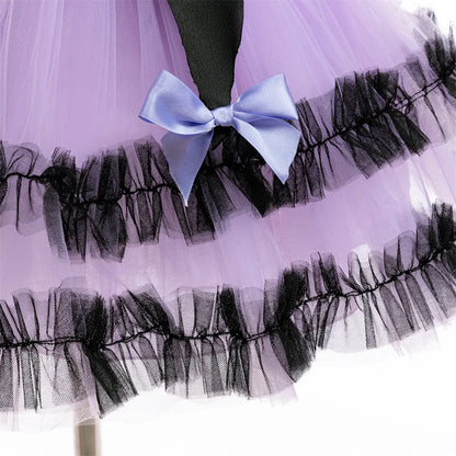 Close-up of the sweet bow detail on the purple Halloween dress