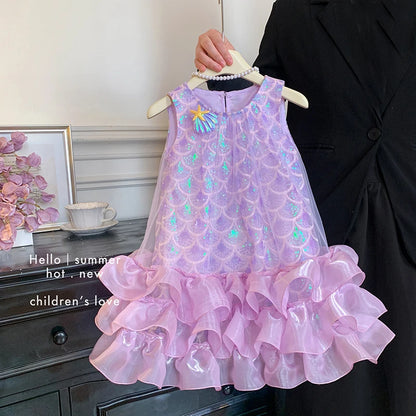 Close-up of the shimmering scale-effect detail on the girls' princess dress