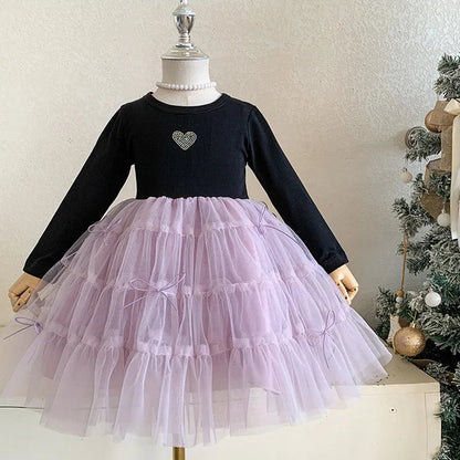Purple crew-neck tiered dress styled for a party